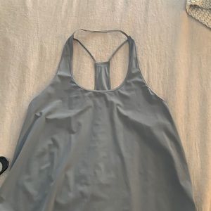 Lululemon racer back tank no size dot but I’d guess a 12-14